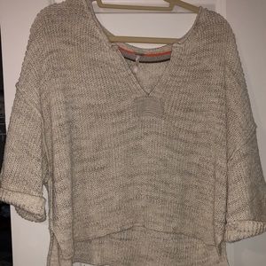 Cropped neutral v neck quarter sleeve sweater